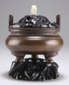 A CHINESE PATINATED BRONZE CENSER