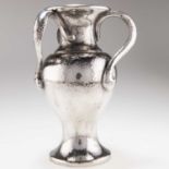 A LIBERTY & CO TUDRIC PEWTER THREE-HANDLED VASE