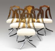 A SET OF SIX MID-CENTURY LUCITE AND CHROME DINING CHAIRS