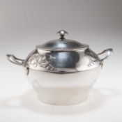 ARCHIBALD KNOX (1864-1933), A RARE LIBERTY & CO TUDRIC PEWTER TWO-HANDLED BISCUIT BARREL