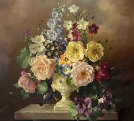 HAROLD CLAYTON (BRITISH 1896-1979) STILL LIFE OF FLOWERS IN AN URN ON A LEDGE