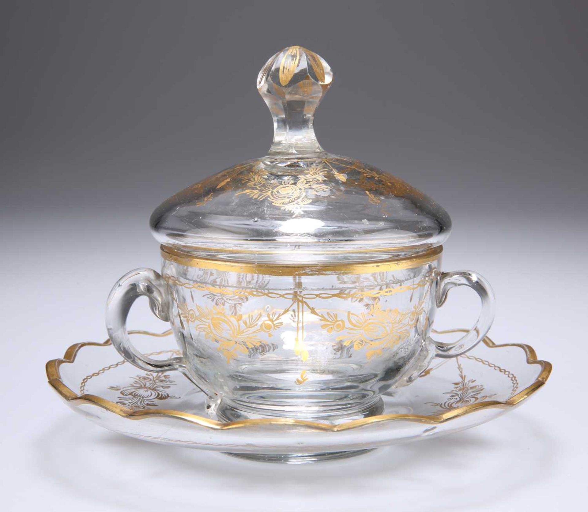 A GILDED CUP, COVER AND SAUCER, 19TH CENTURY