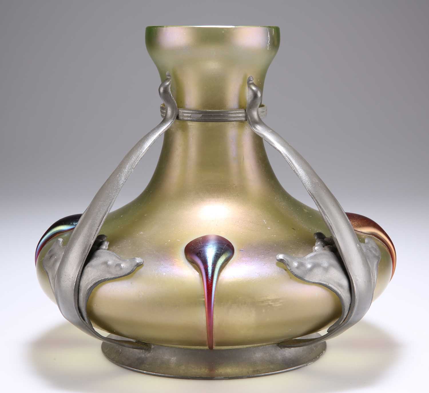 AN ART NOUVEAU PEWTER-MOUNTED IRIDESCENT GLASS VASE, IN THE STYLE OF LOETZ