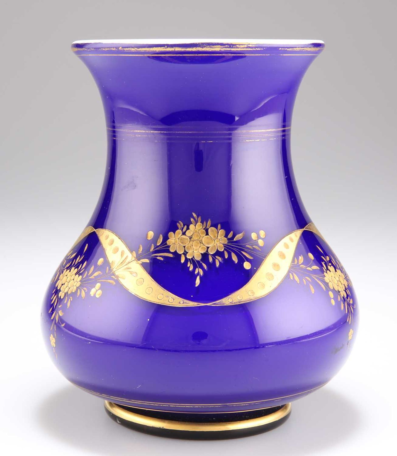 A BOHEMIAN BLUE AND GILT GLASS VASE, CIRCA 1880