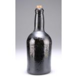 A BROWN GLASS BOTTLE