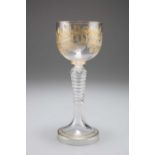 A ROEMER STYLE HOLLOW STEMMED WINE GLASS, CIRCA 1830