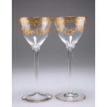 A PAIR OF CONTINENTAL GILDED WINE GLASSES, CIRCA 1895