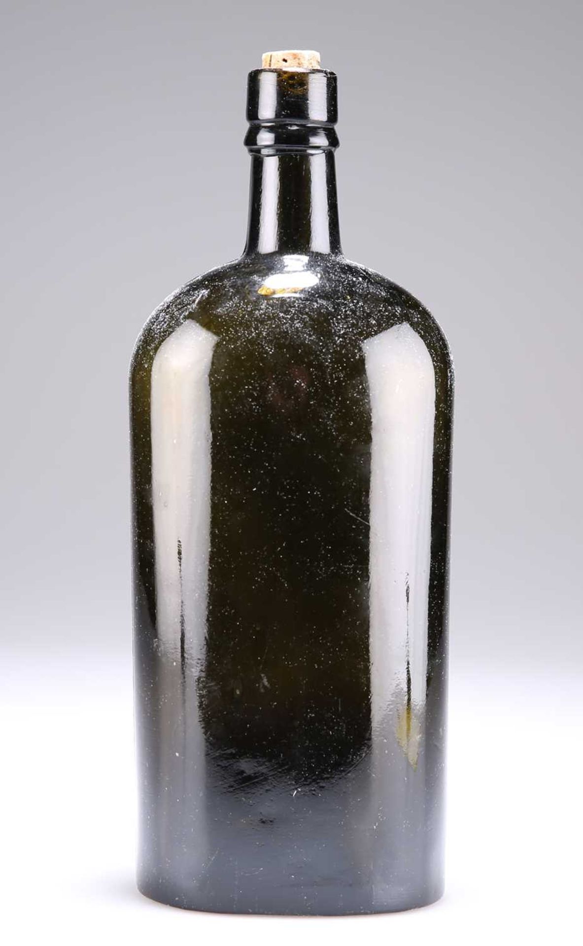 A GREEN/BROWN GLASS BOTTLE BY W & A GILBEY LTD