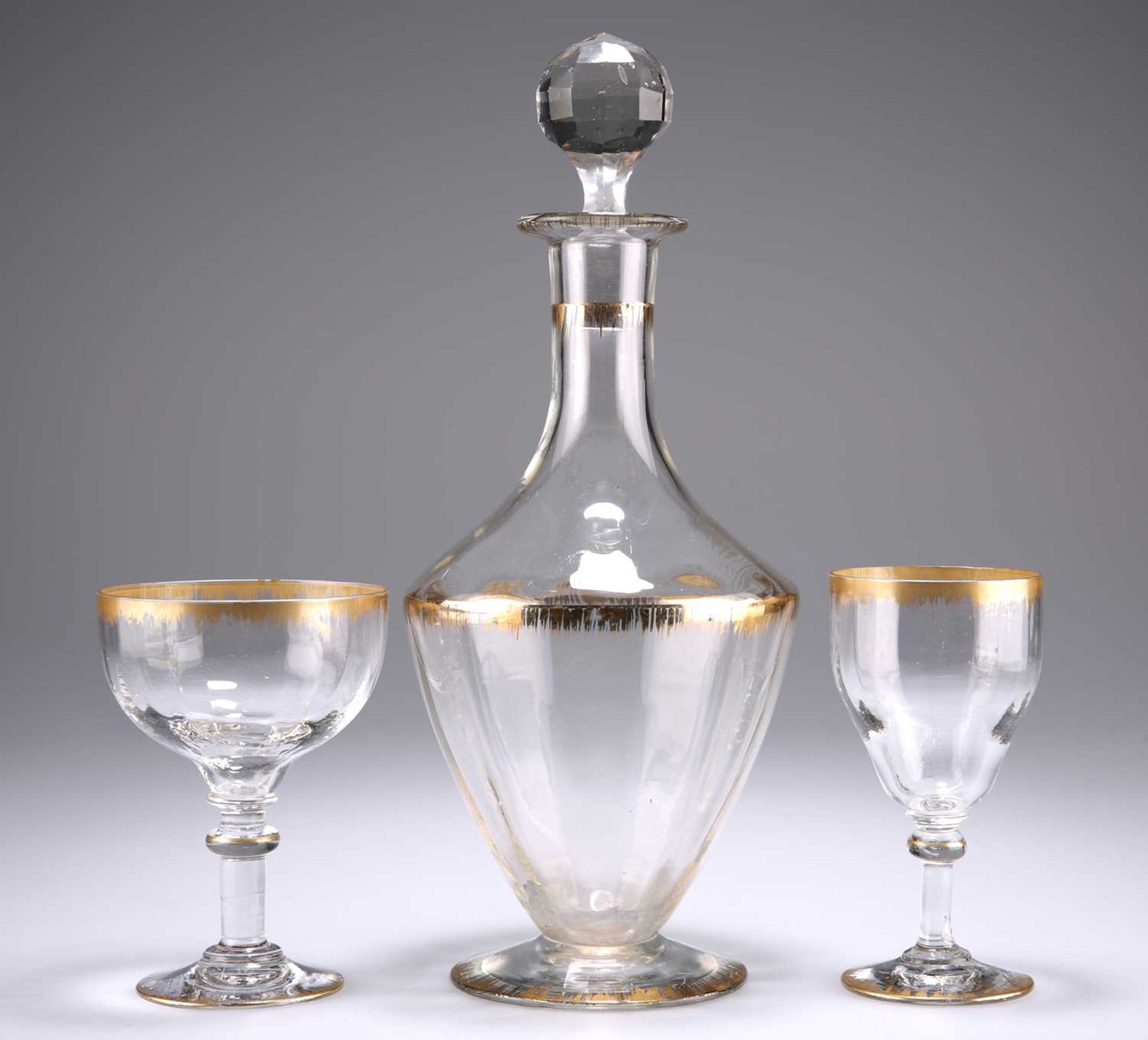 A LEGRAS 'POLECAT' DECANTER WITH STOPPER AND TWO GLASSES