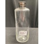A LATE VICTORIAN SILVER-PLATE TOPPED BOTTLE
