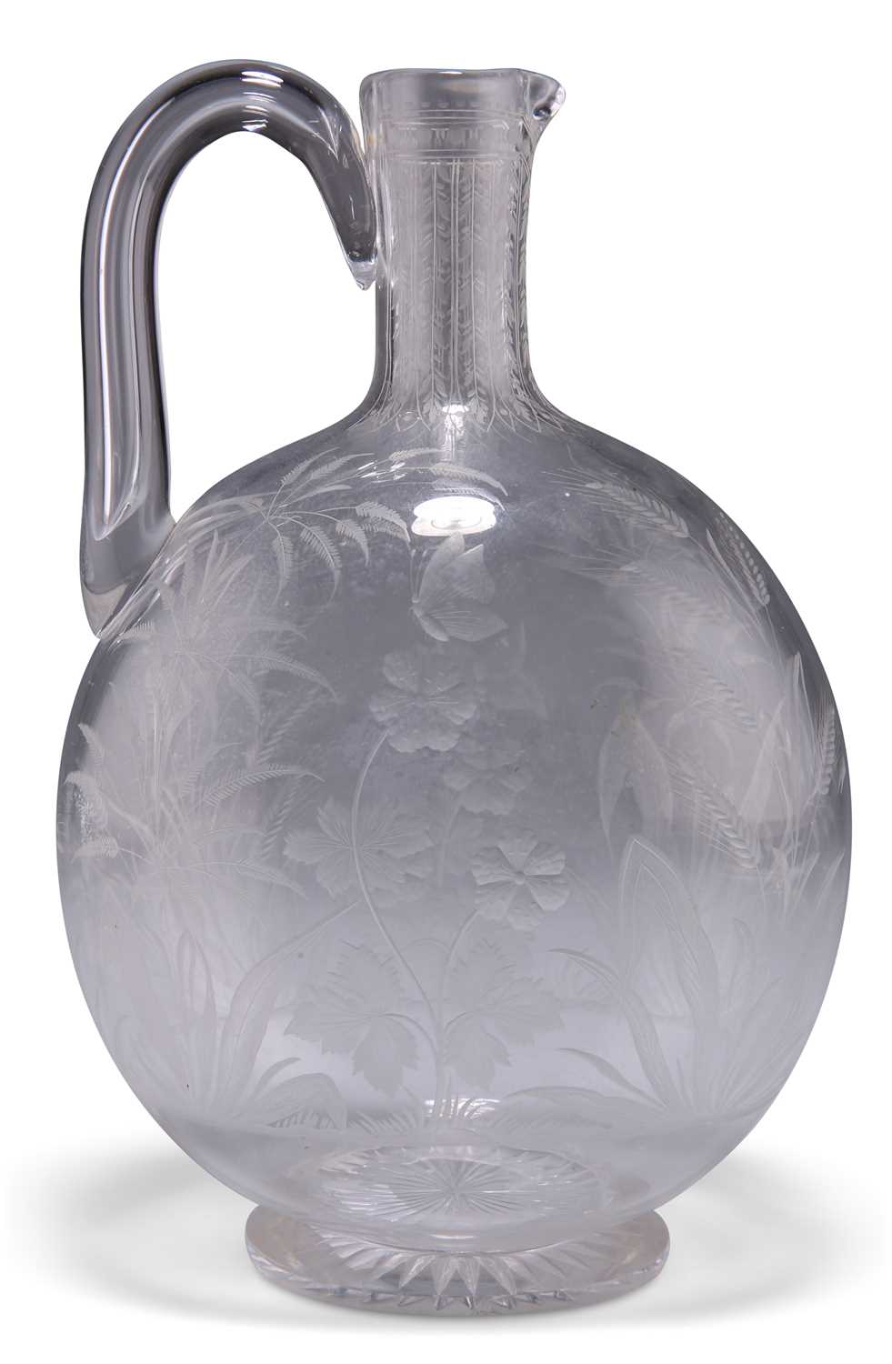 A GLASS CLARET JUG, CIRCA 1870