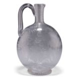A GLASS CLARET JUG, CIRCA 1870