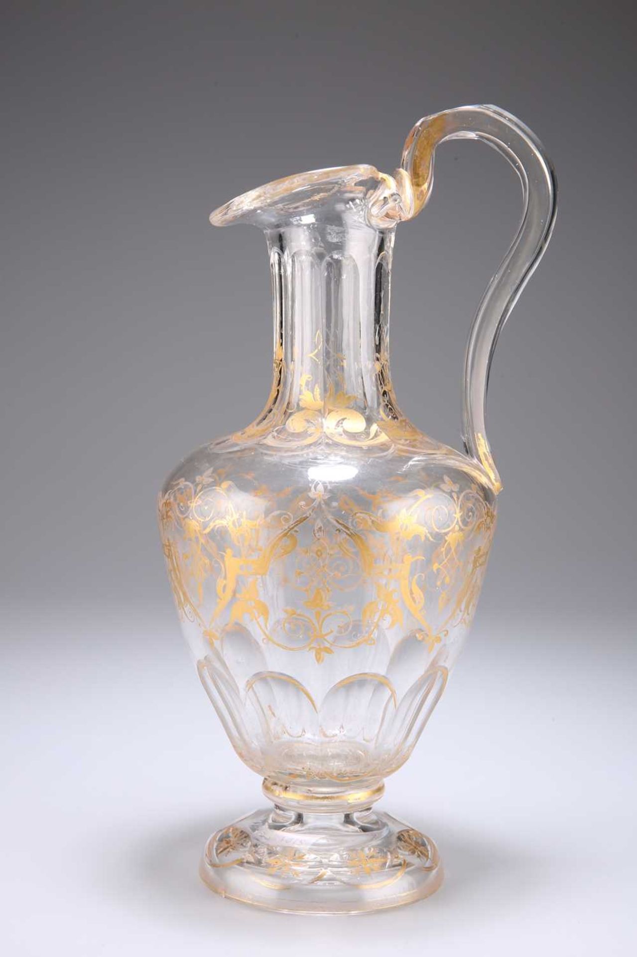 A LARGE GILDED GLASS EWER, MID-19TH CENTURY