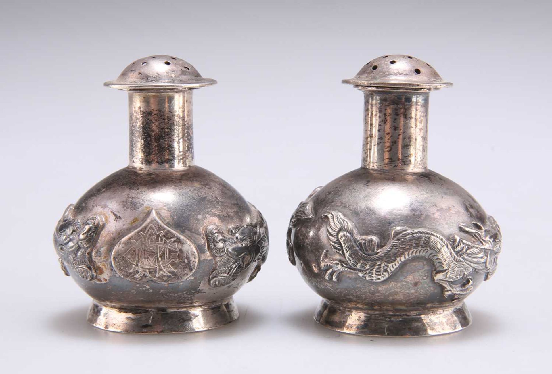 A PAIR OF 19TH CENTURY CHINESE SILVER PEPPER POTS