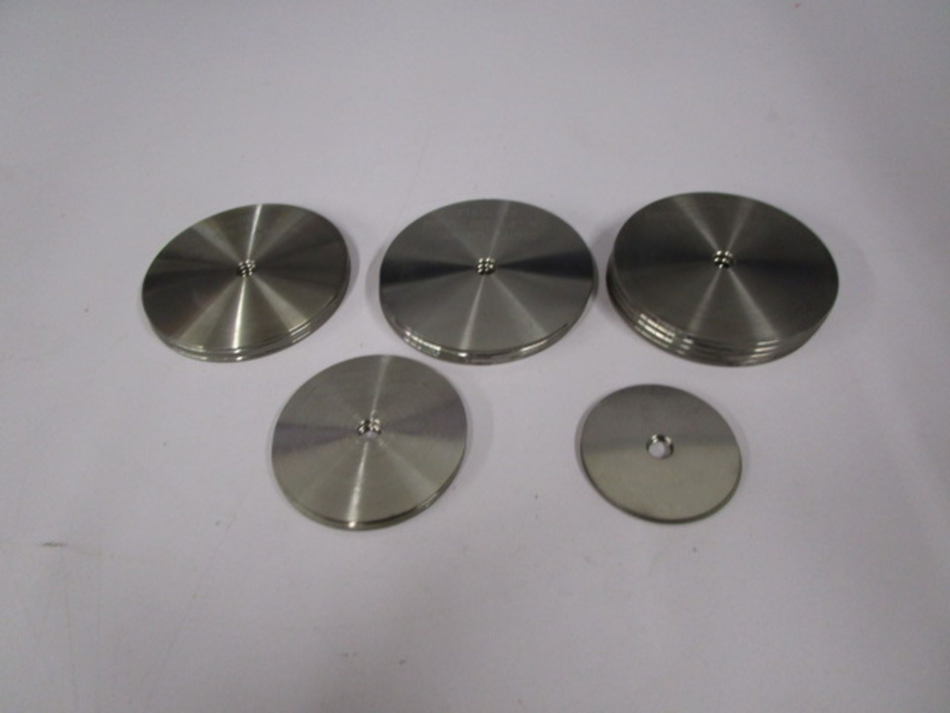 PRESS WEIGHTED DISCS