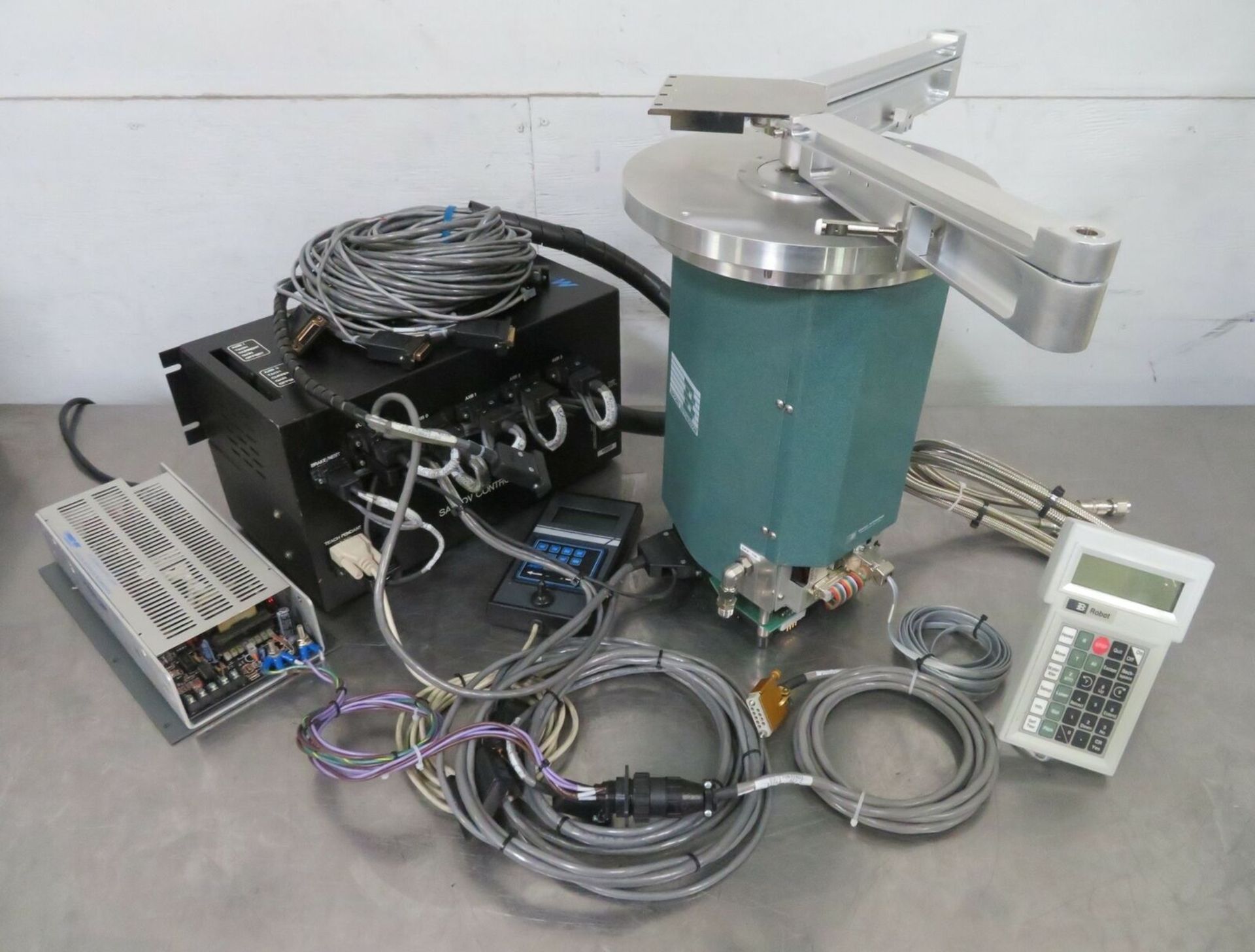 Brooks 001-7500-05 VacuTran 5 Wafer Robot w/ Controller + Teach Pendants. Includes a Brooks