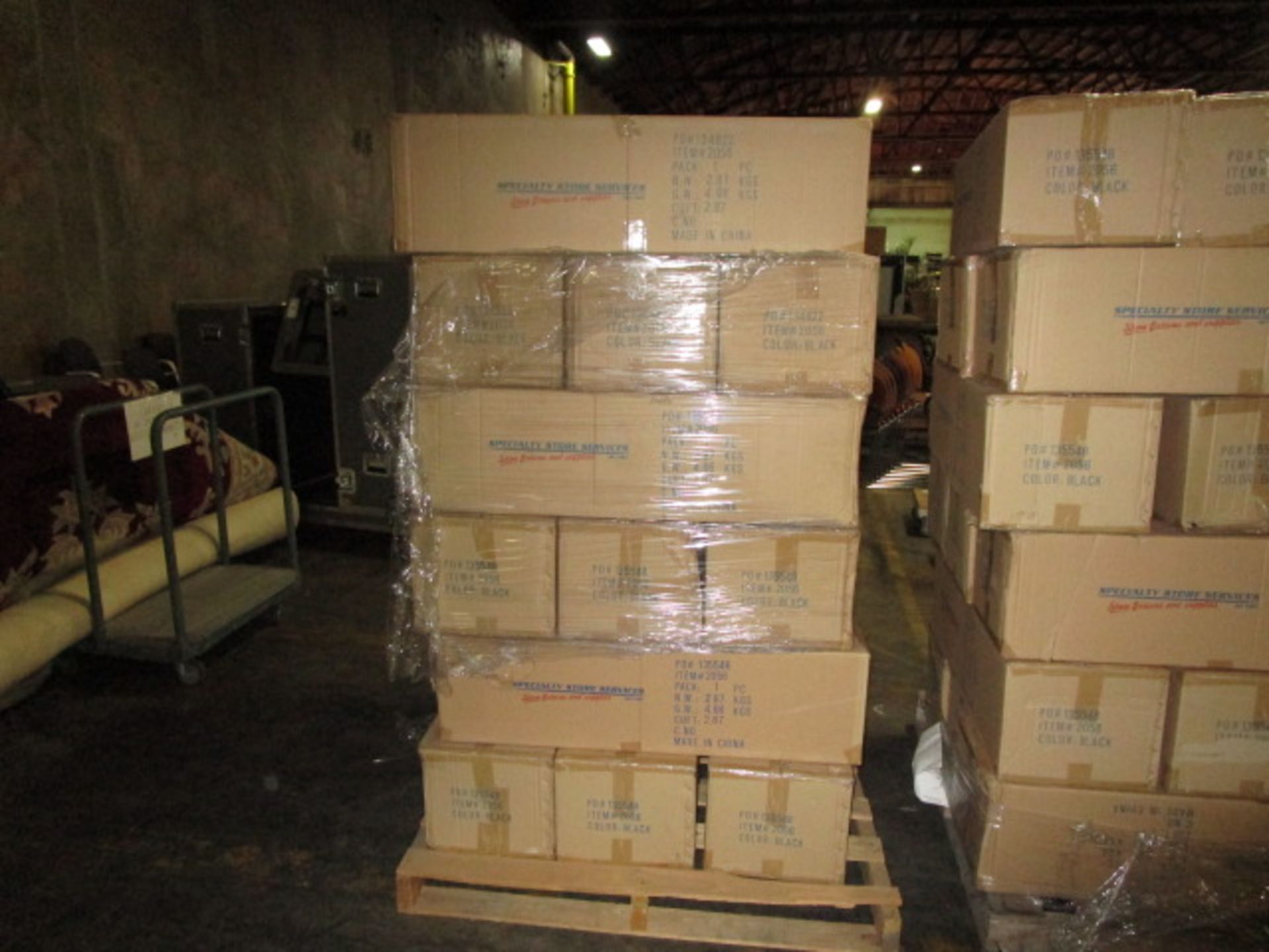 PALLET CONTAINING CONTENTS OF MAGAZINE RACKS