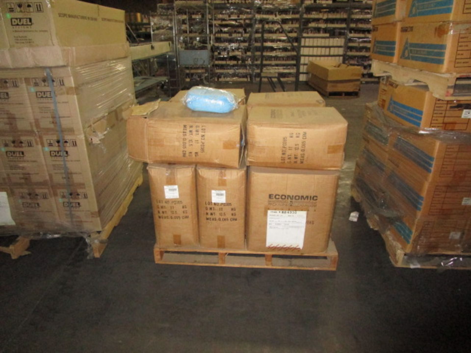 PALLET CONTAINING CONTENTS OF ECONOMIC NON-SKID BLUE SHOE COVERS