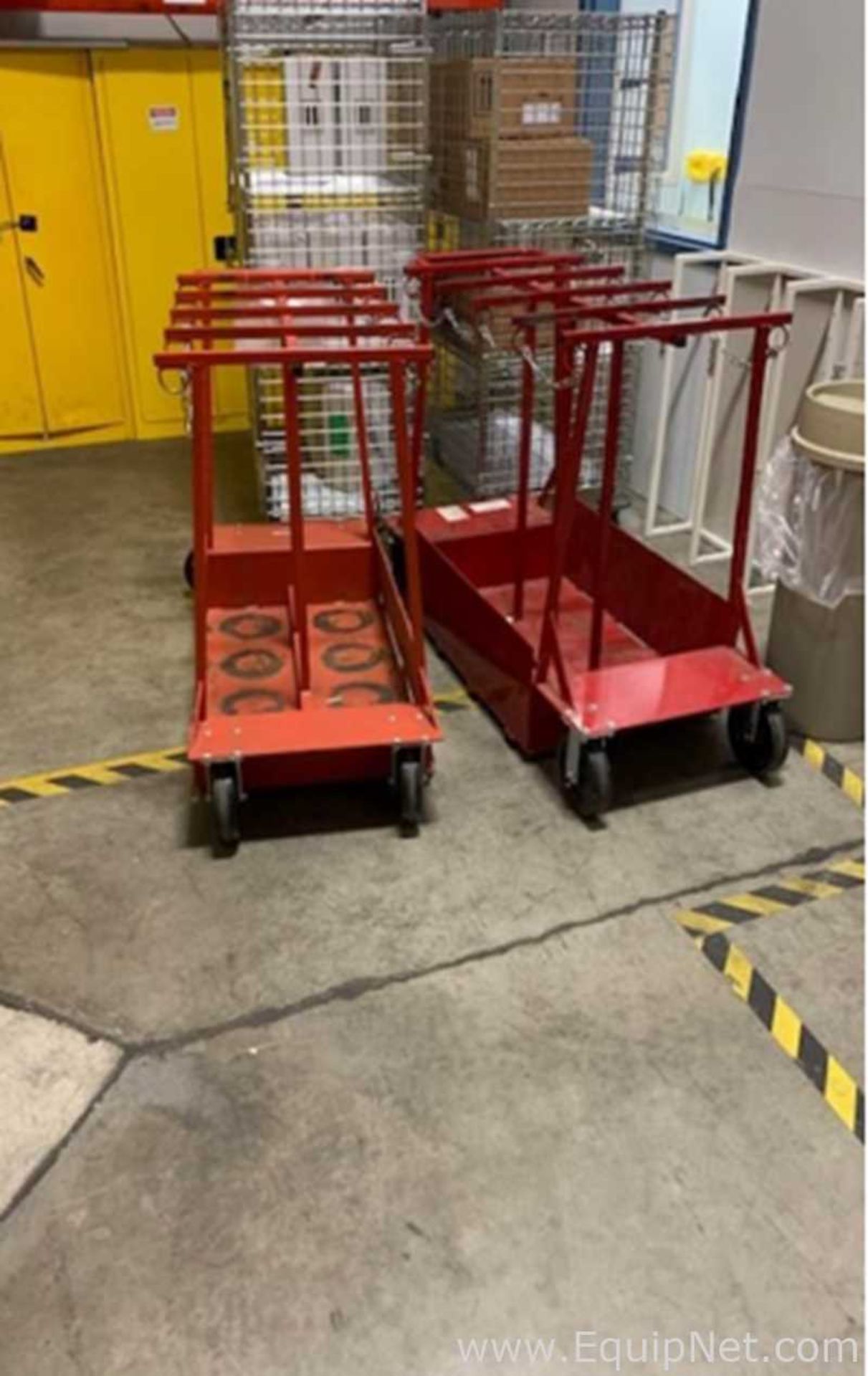 DESCRIPTION: Lot of 2 Oxygen Bottle Carts with 8 Bottle Capacity and Safety Chains EQUIPNET