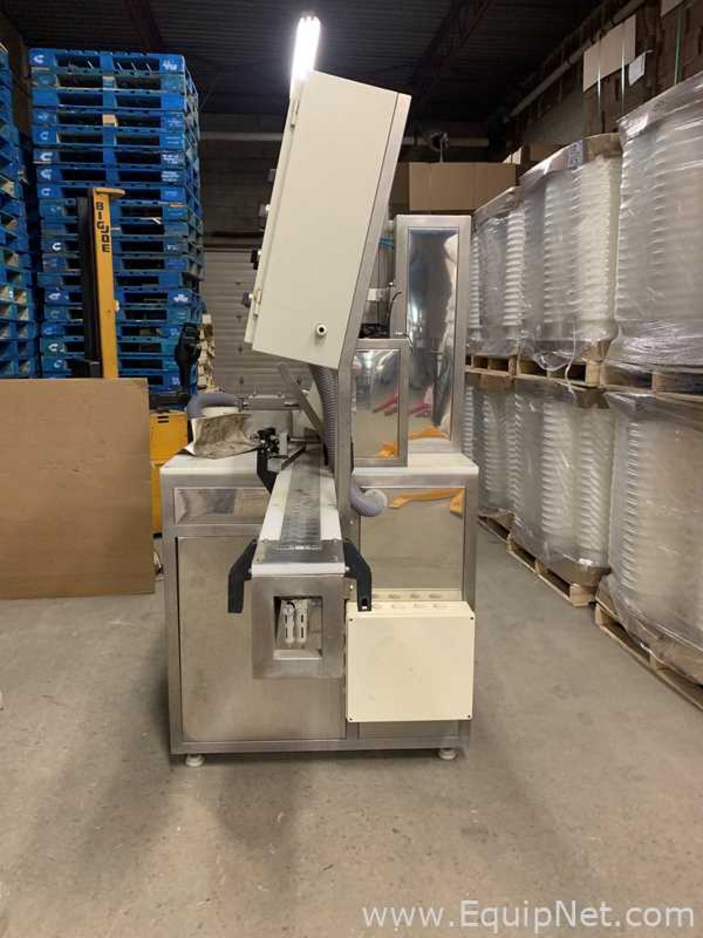 DESCRIPTION: Custom Stretch sleeve labeler.The stretch sleeve is an elastic label that is - Image 16 of 21
