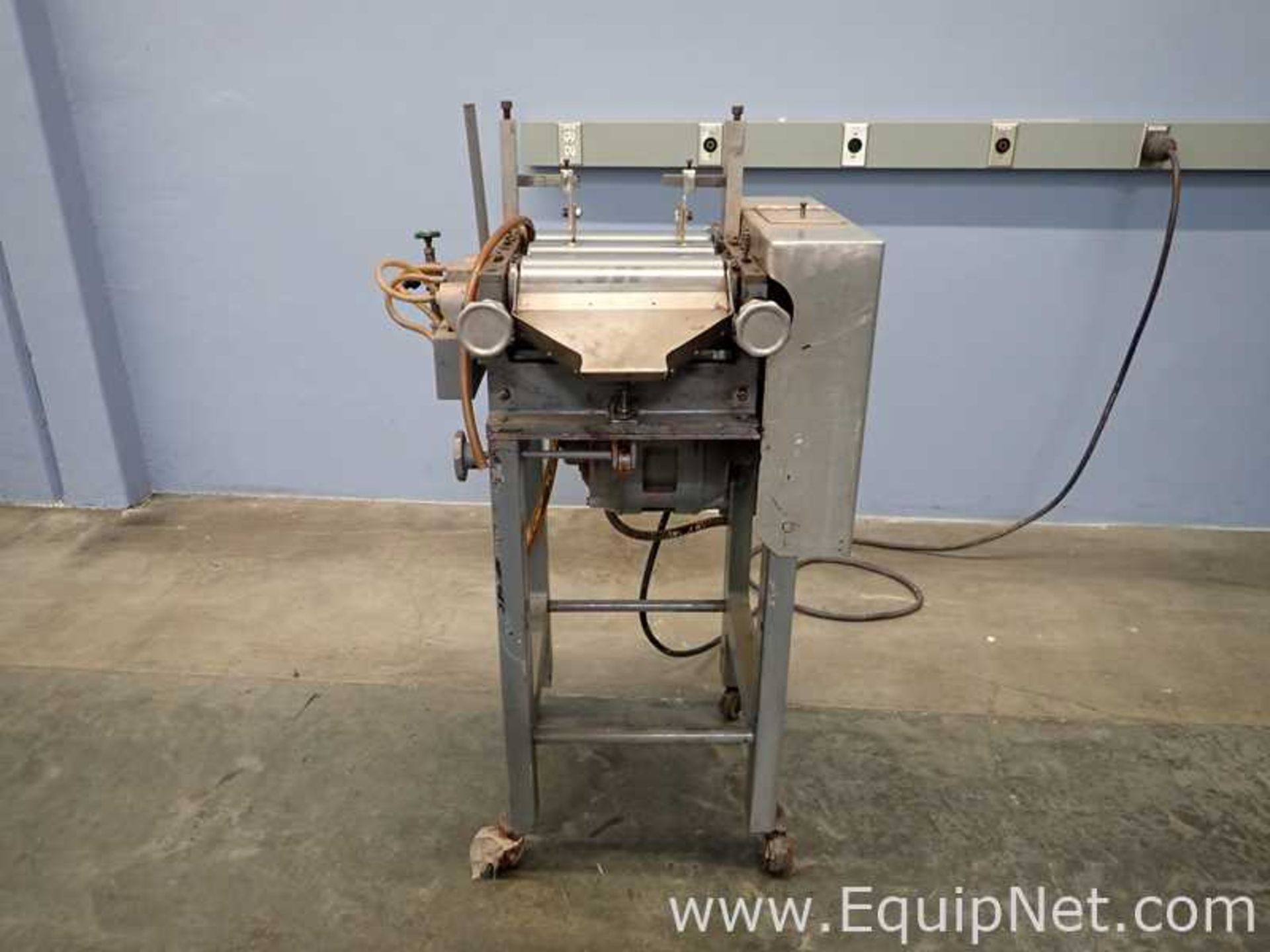 DESCRIPTION: This three roll mill is appx 12" in length EQUIPNET LISTING # 720238 HANDLING FEE: $