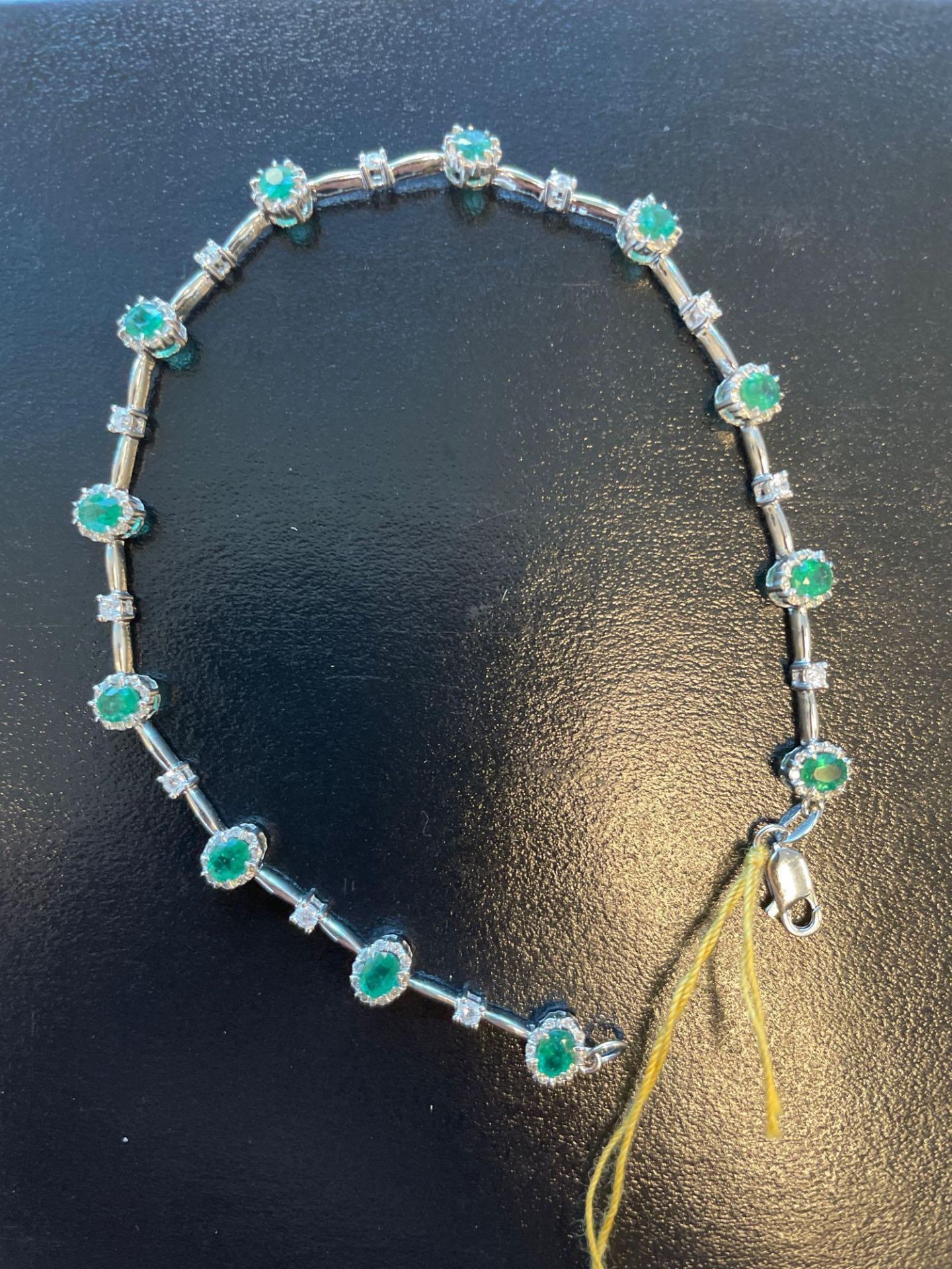 14k White gold Lady's Custom Made Diamond & Emerald Bracelet