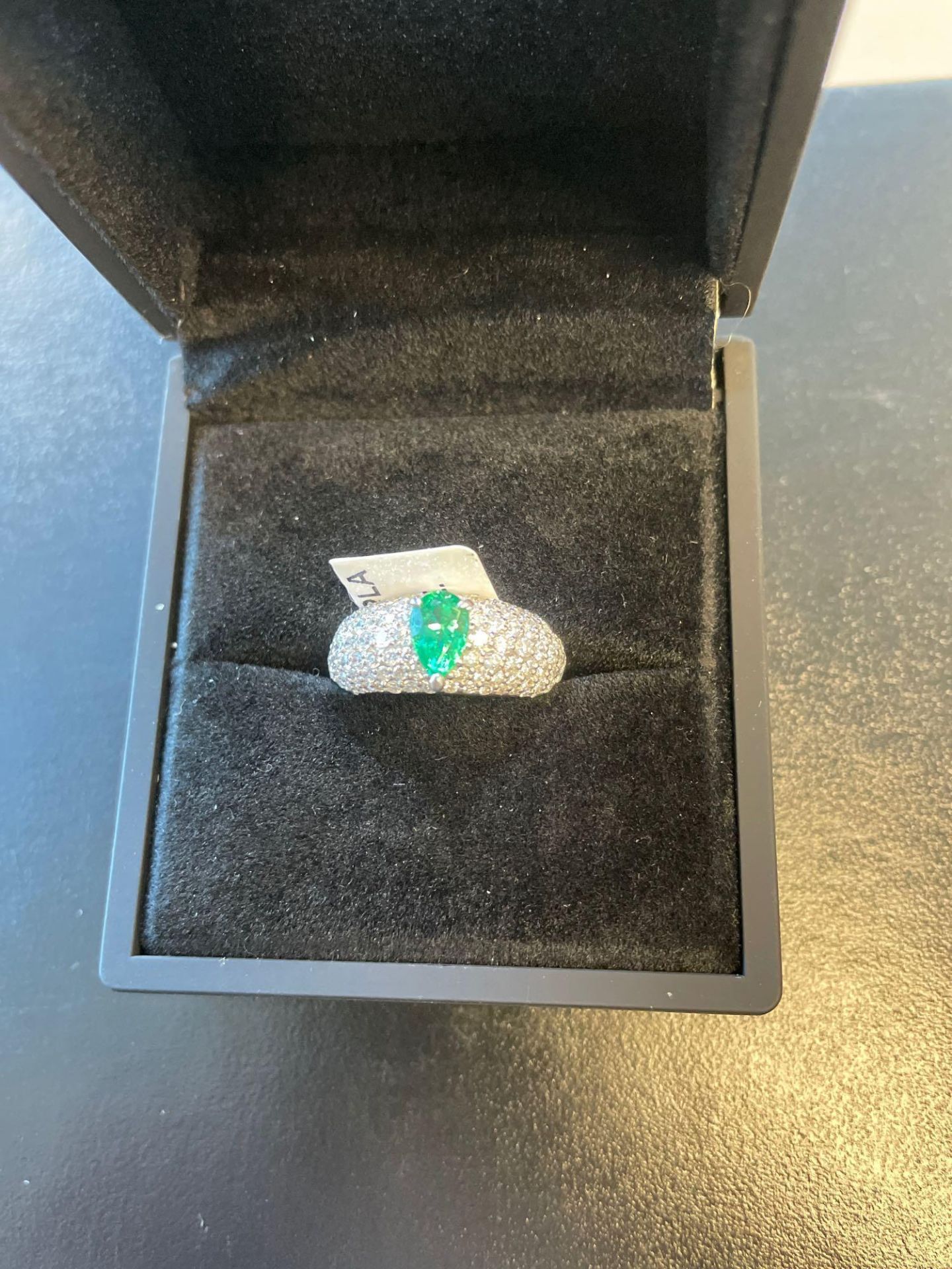 Platinum Emerald & Diamond Ring .78 emerald/1.17 ctw Diamond size 4.5?