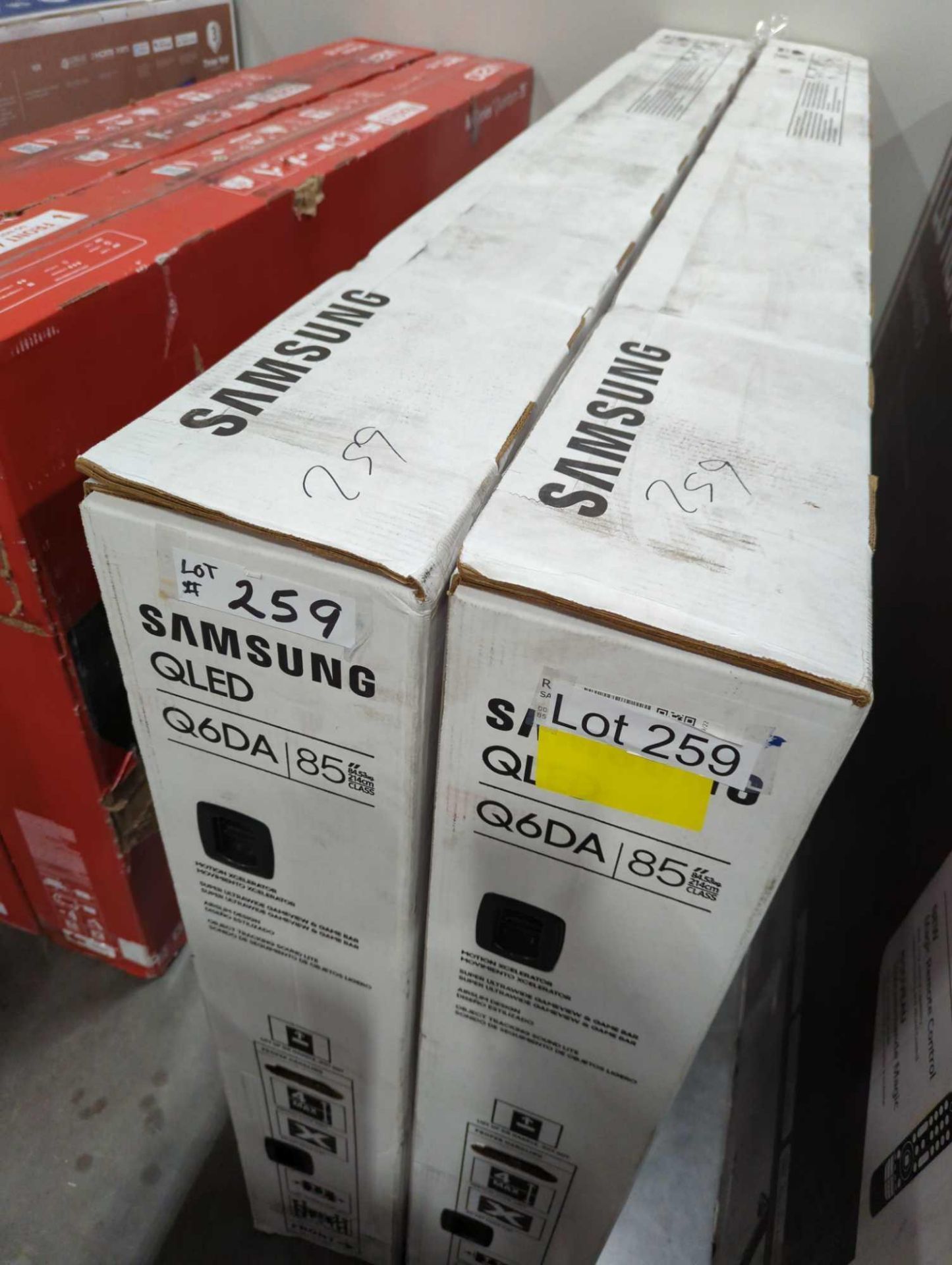 two Samsung q6da 85 in TVs