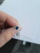 18KT White Gold Diamond and Blue Sapphire Ring