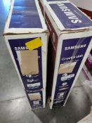 two Samsung 75 inch TVs