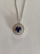 14KT White Gold Diamond and Tanzanite Pendant