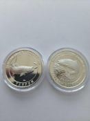 2 North American Fishing Coins