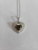 Oscar Friedman 18KT White Gold Diamond Pendant, 8.62 heart cut diamond, 2.89 other diaonds