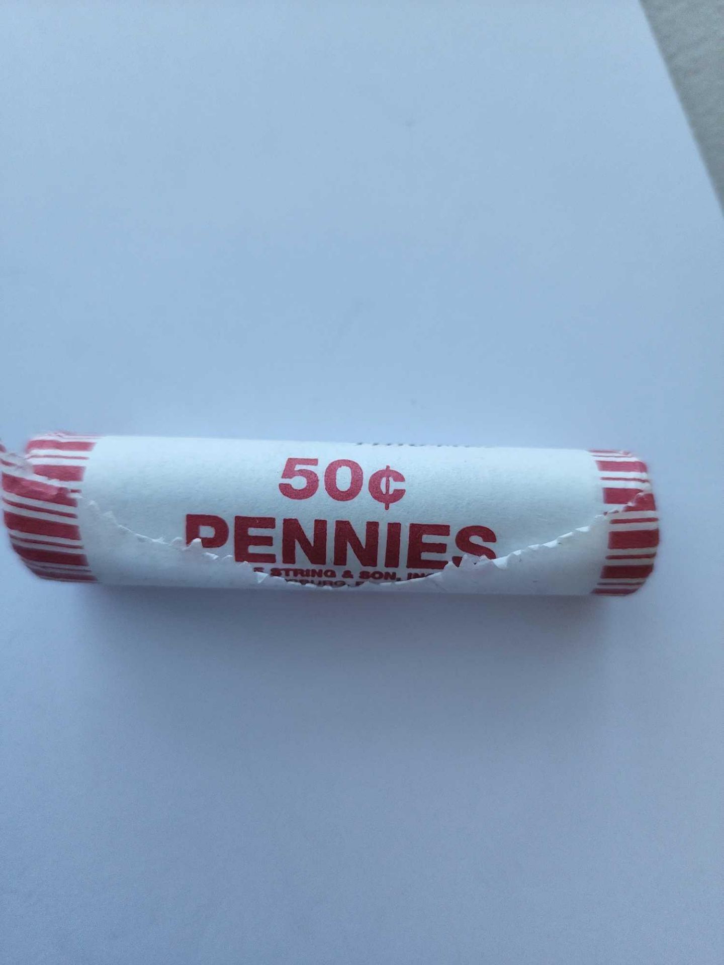 misc roll of 50 pennies from the 1930s