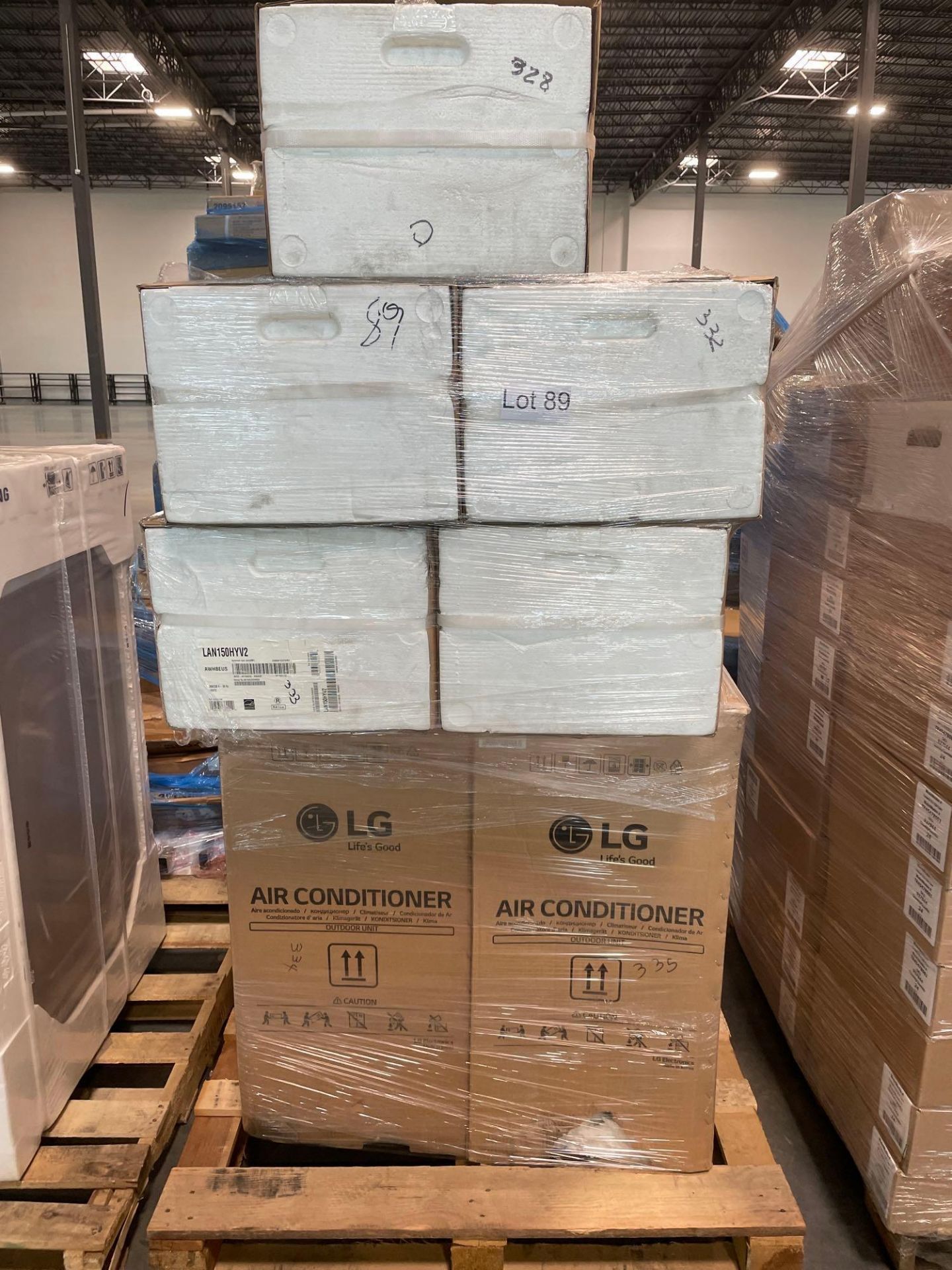 pallet of LG air conditioner units two different models