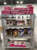rolling cart of American girl dolls and other assorted dolls
