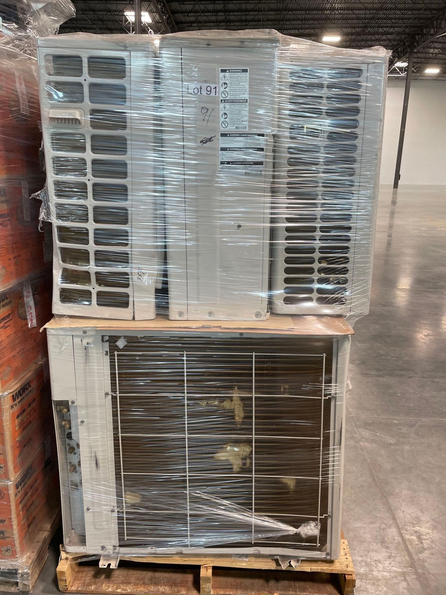 pallet of multiple LG dual inverter industrial AC units
