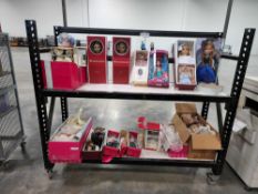 rolling rack of American girl dolls