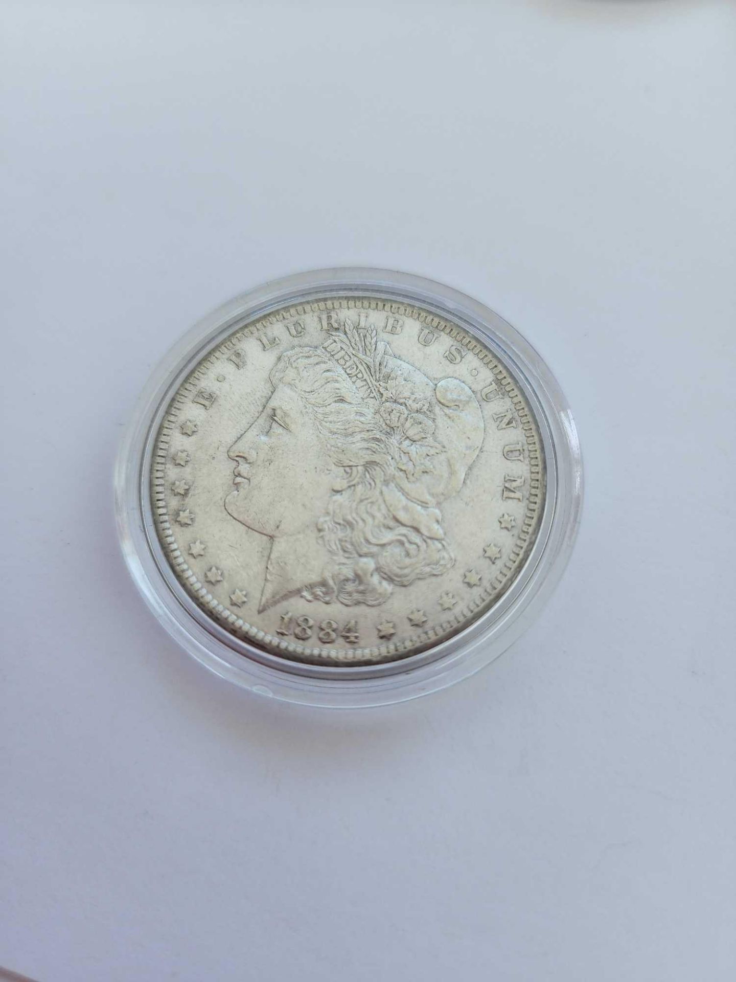 1884 AU Morgan Dollar