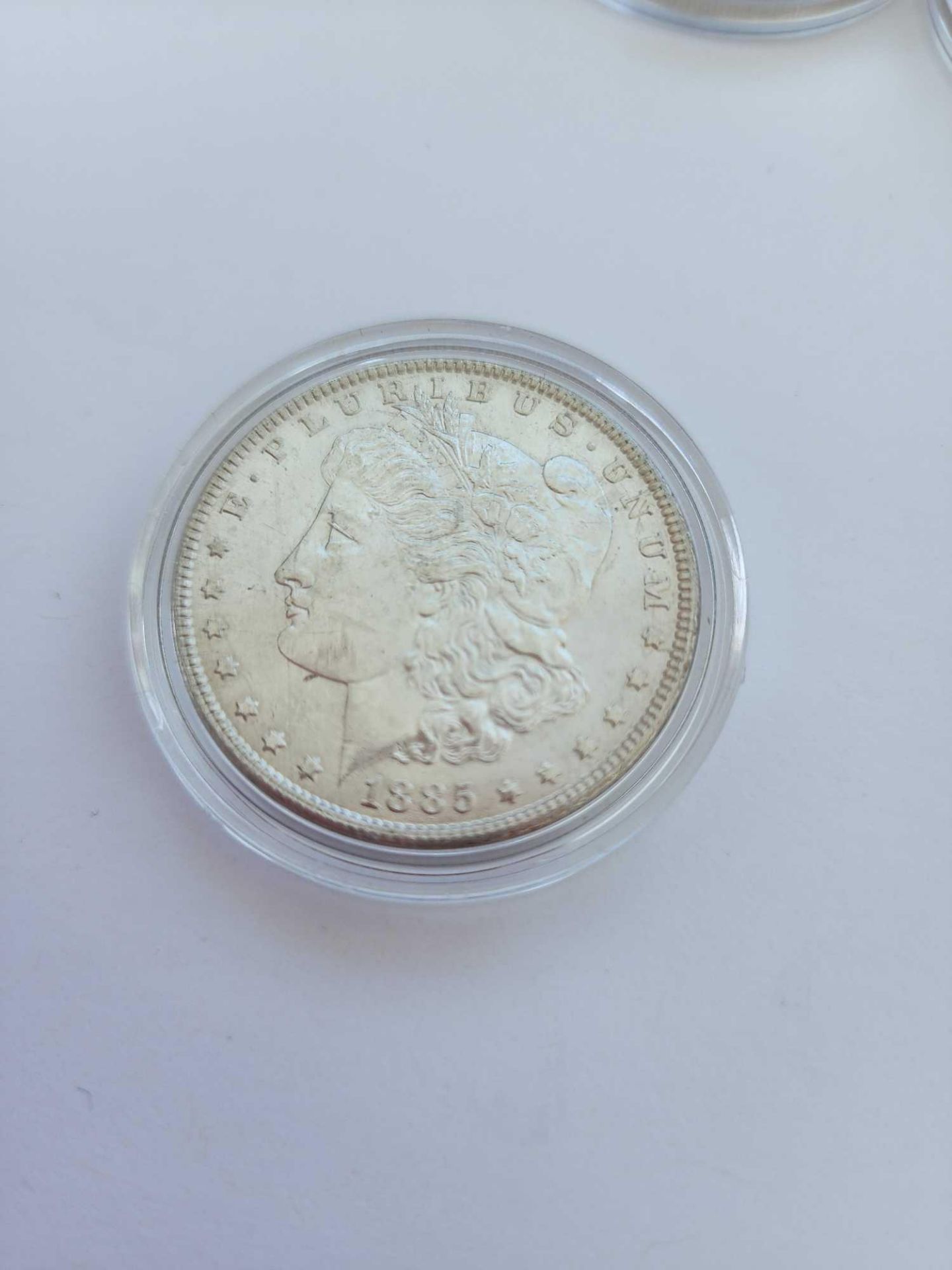 1885 AU Morgan Dollar