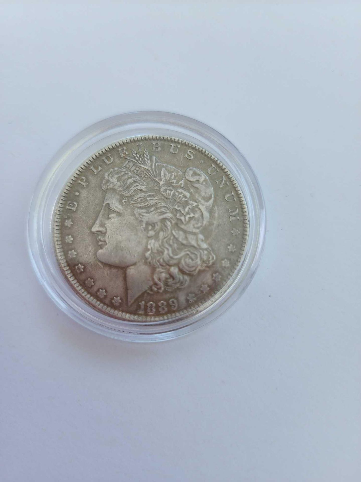 1889 AU Morgan Dollar