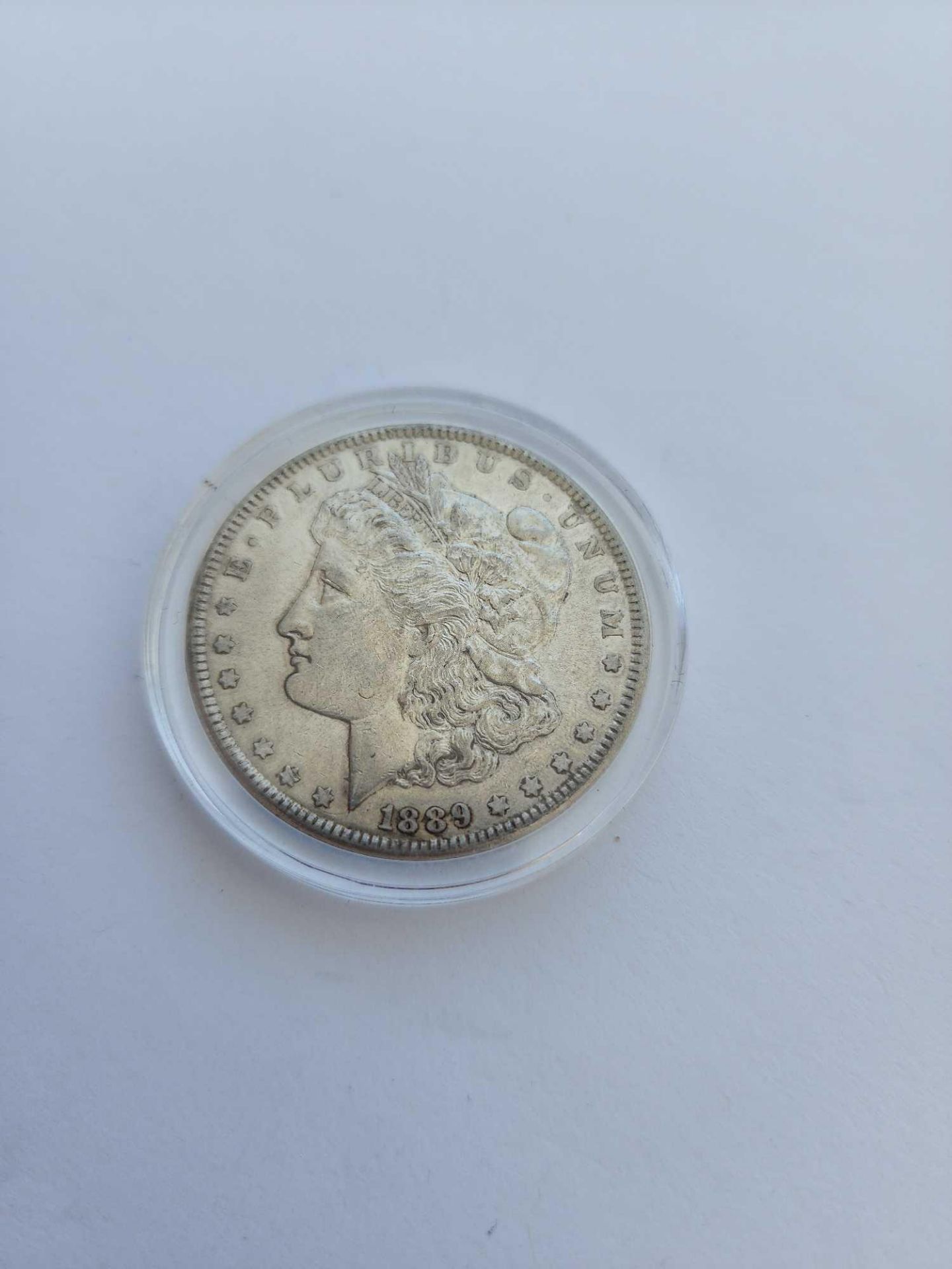 1889 AU Graded Morgan Dollar