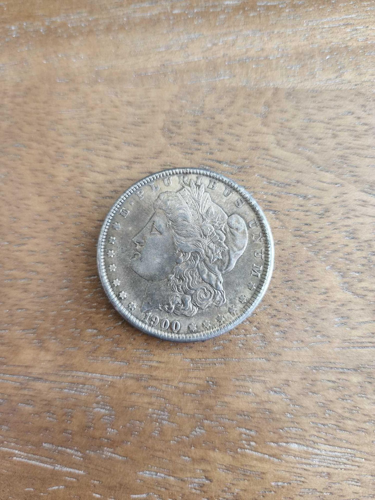 1900 AU Graded Morgan Dollar