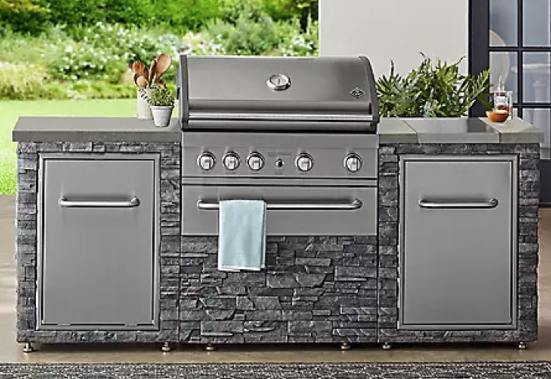 Deluxe stacked stone 4 burner propane gas grill island