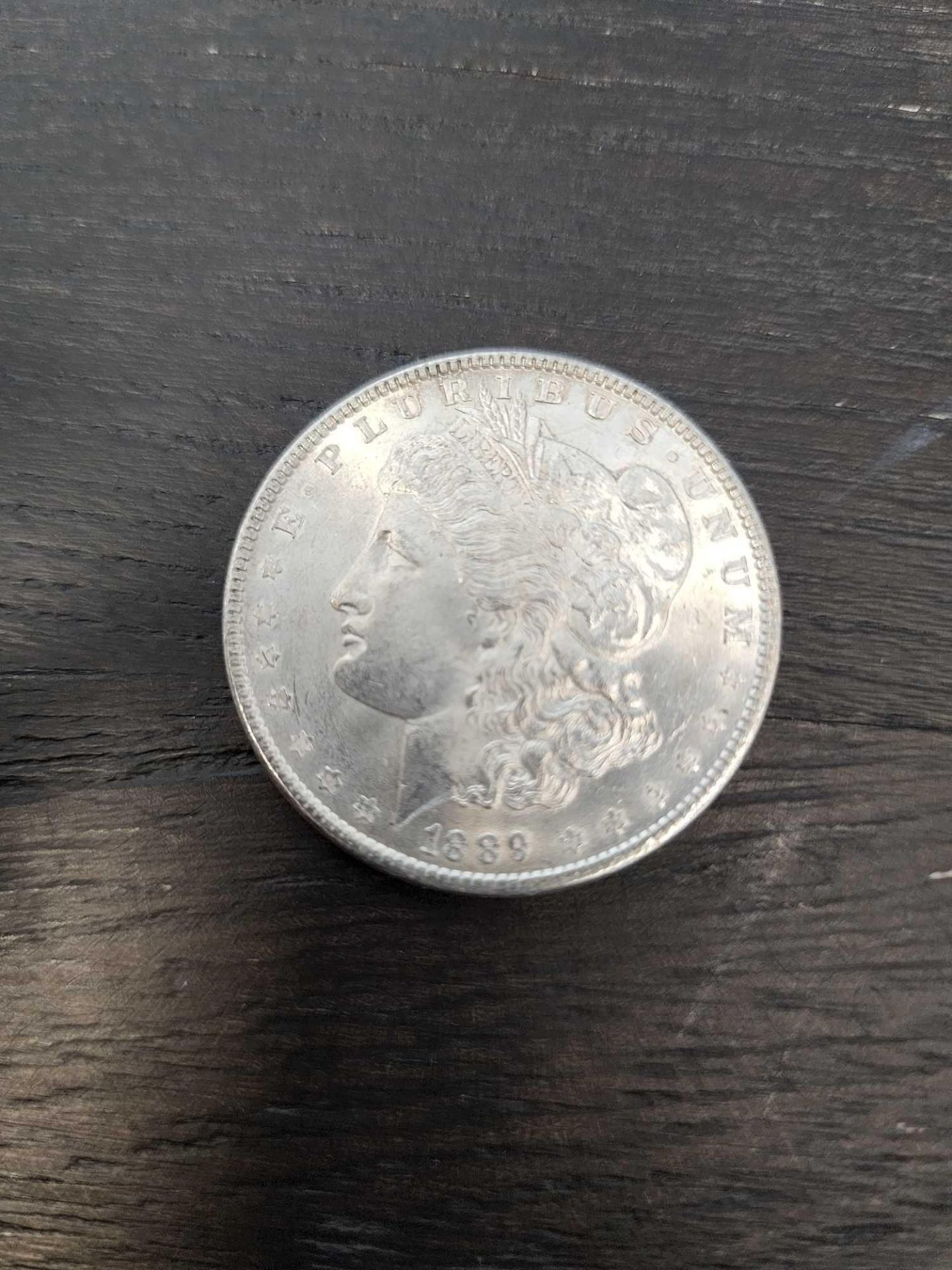 1889 AU Graded Morgan Silver Dollar