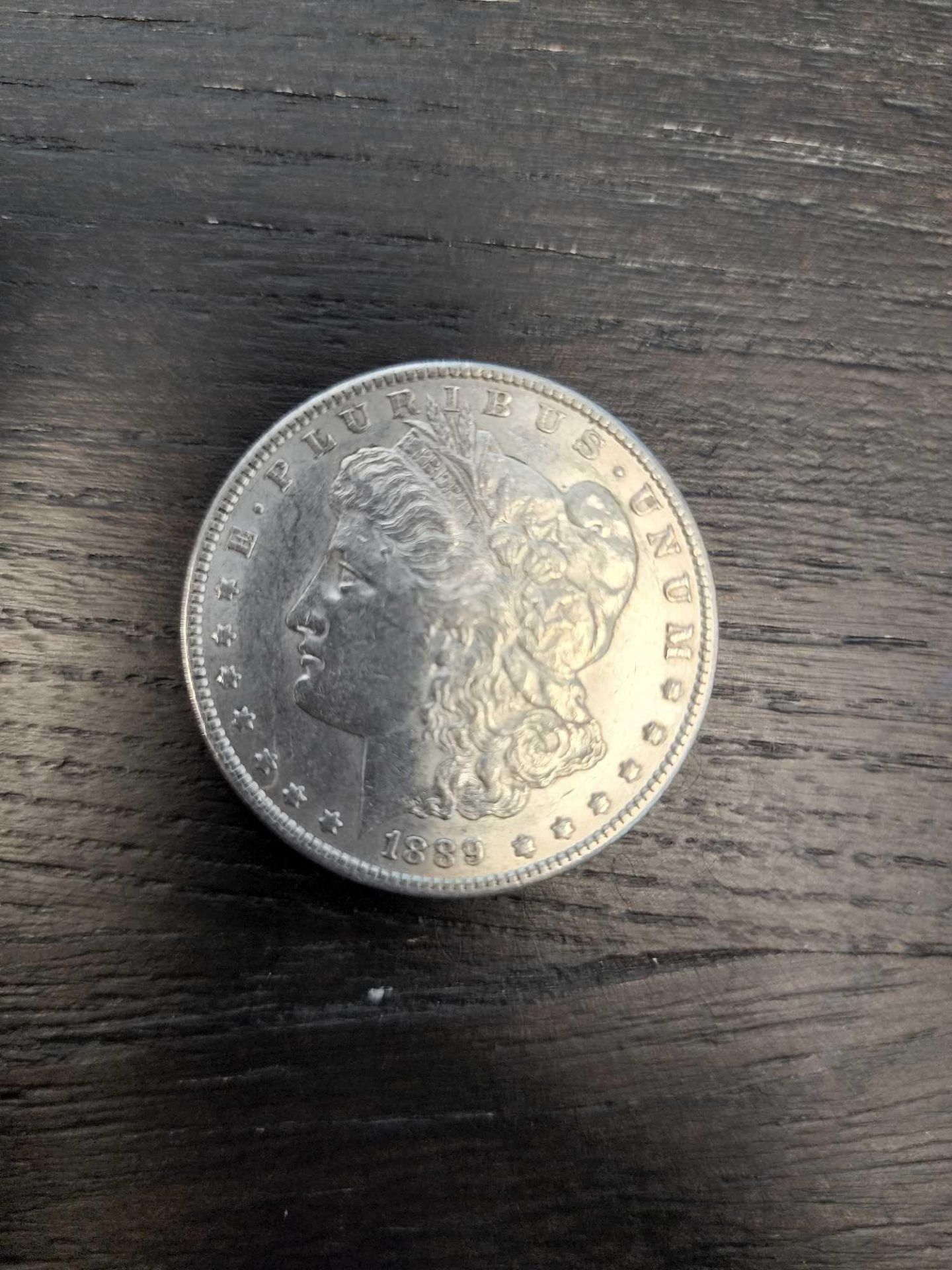 1889 AU Graded Morgan Silver Dollar