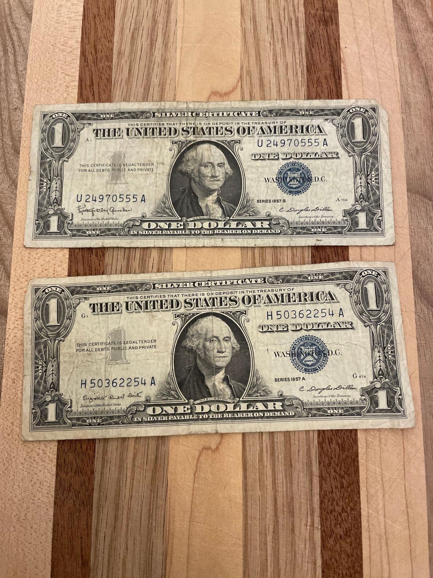 Two $1 Blue Seal Silver Certificates