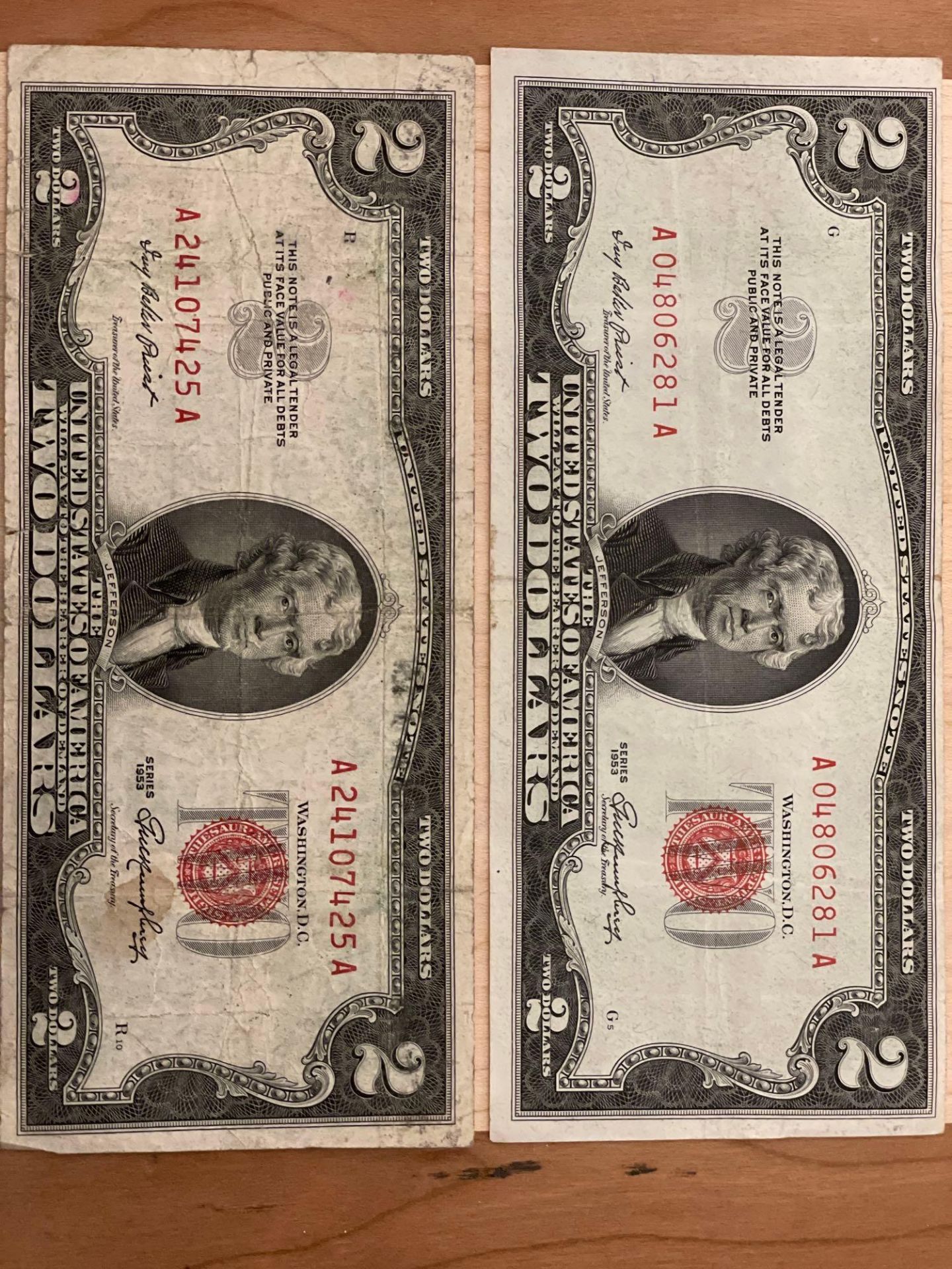 Two $2 Red Seal Bills