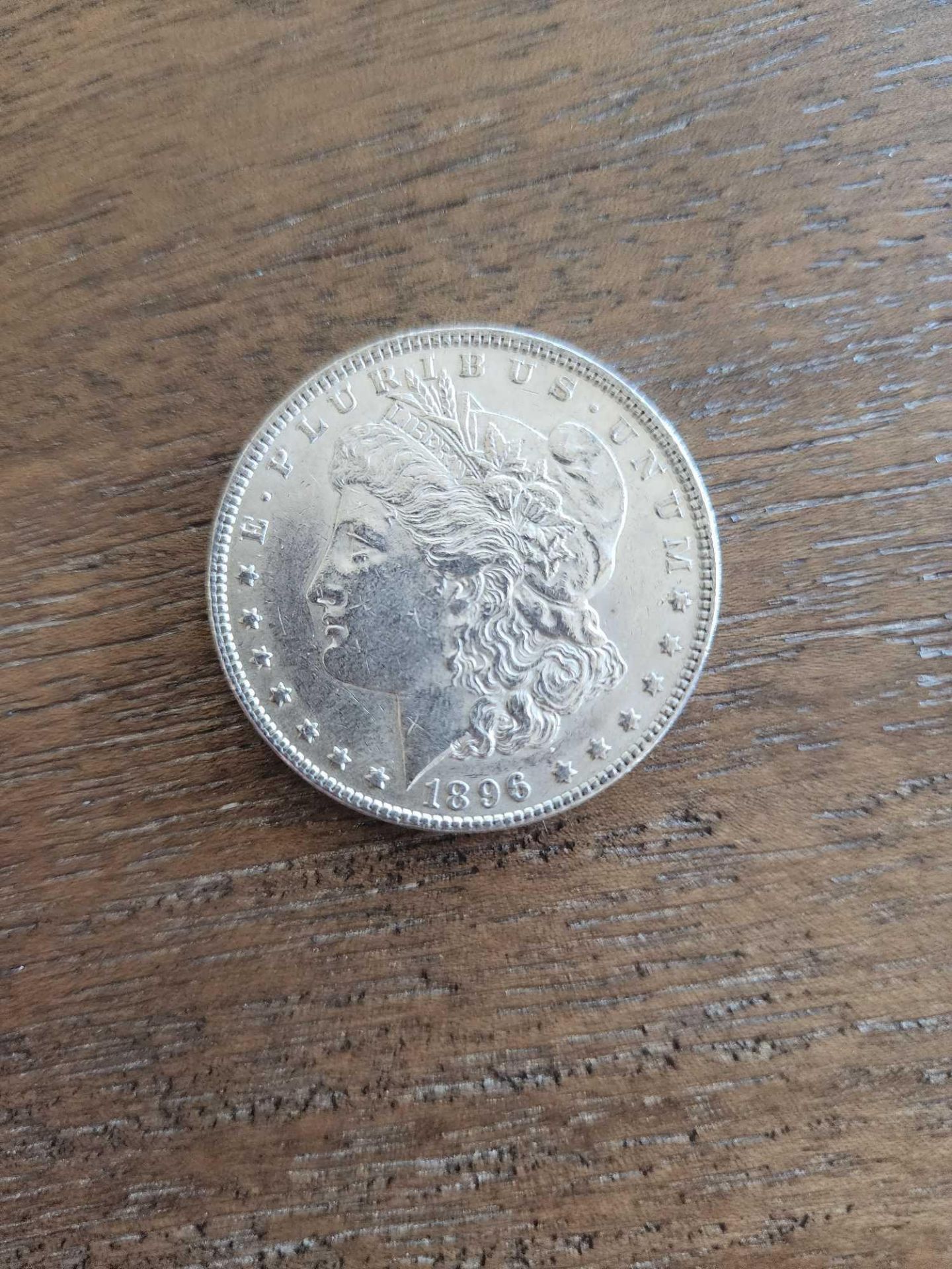 1896 AU Graded Morgan Dollar