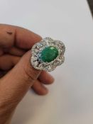 Dyed Green Beryl (Emerald) 775 Cts with white sapphire stones